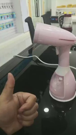 مكواة بخار الملابس المحمولة