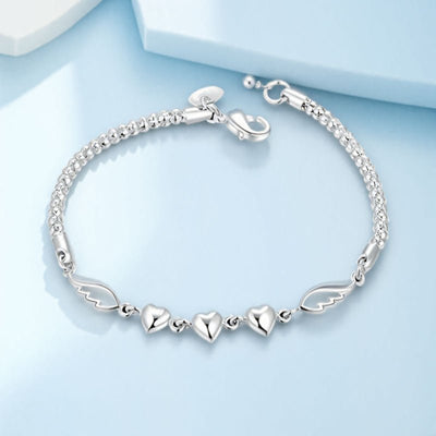 Stylish Silver - Plated Minimalist Heart - and - Feather Bracelet For Women - Zambeel